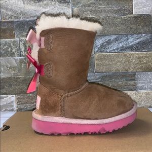 Baby girl UGGS with pink bows.